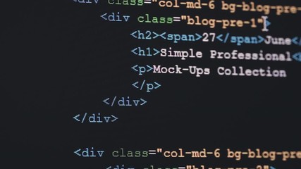 Wall Mural - 4k close up shot html tag code on pc monitor scroll down. background concept for programming and cod