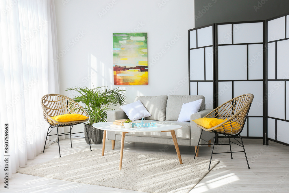 Interior of modern room with comfortable sofa