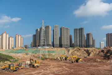 Wall Mural - Urban development construction site and building landscape