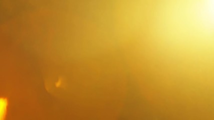 Wall Mural - beautiful warm lens flares on black background. perfect as overlay on your own footage. vintage art 