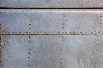 Old aircraft aluminum texture with rivets.