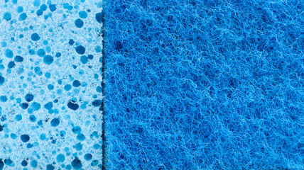 Wall Mural - Background in the form of a porous structure in blue. Macro sponge. Close up blue sponge surface for textured background. copy space.