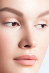 Poster - Young beautiful woman with clean perfect skin close-up