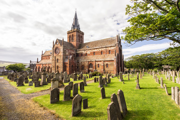 st magnus cathedral and surrounding gothic graveyard in kirkwall, orkney islands, scotland. the holy