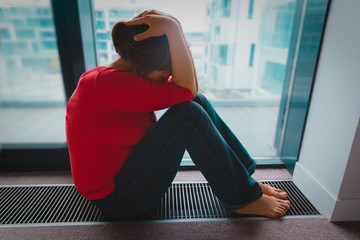 Wall Mural - stressed sad woman, despair and depression from staying home