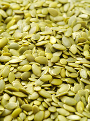 Poster - Macro background texture of green pumpkin seeds