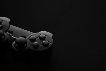 Black and white photo of the gamepad, there is a place for text