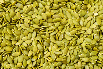 Poster - Macro background texture of green pumpkin seeds