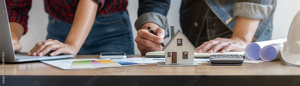 Interior designer and Architect choosing color in color swatch samples ...