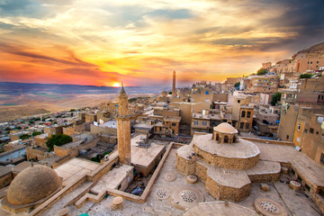 Wall Mural - Mardin landscape beautiful sunset with clouds Turkey. With minarets is best touristic destination of Mardin. 