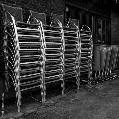 Stack Of Chairs Outside Shop