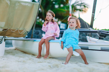 Two kids having fun at tropical beach