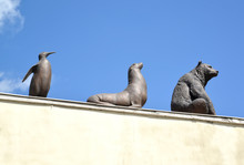 KALININGRAD, RUSSIA. Bronze Sculptures Of Penguin, Sea Cat And Bear At The Zoo Entrance