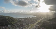 Aerial Hyperlapse Of Sunny Afternoon With Busy Traffic In Caraguatatuba, A Small Town By The Atlantic Ocean