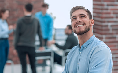 Canvas Print - Cheerful man smiling in office.