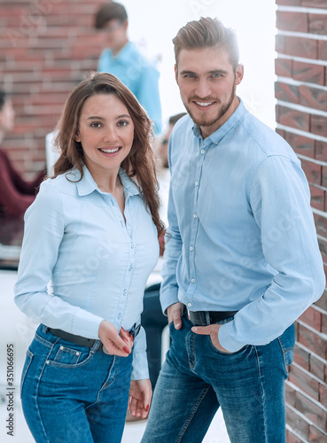 Cuadros en Lienzo Portrait of smiling designers standing in office.