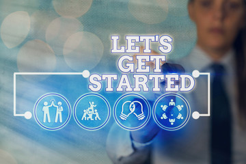 Wall Mural - writing note showing let s get started. business concept for encouraging someone to begin doing some