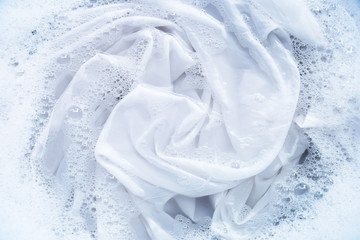 Soak a cloth before washing, white cloth