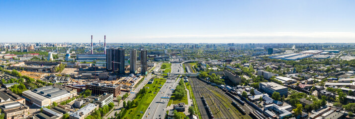 Wall Mural - Aerial top view of road junction in Moscow from above, automobile traffic and the old Ugreshskaya railway station in the Moscow industrial zone near the automobile ring highway