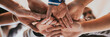 © rawpixel.com - Group of diverse people stacking hands in the middle