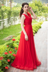 a young girl in red dress