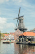 HAARLEM, NETHERLANDS, AUGUST 2019: Medieval Adriaan windmill in Haarlem, the Netherlands in summer