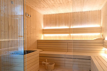 Empty Interior Of Traditional Finnish Sauna Room. Modern Wooden Spa Therapy Cabin With Hot Dry Steam