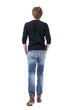 © sharplaninac - Back view of handsome young stylish man in black shirt and jeans walking away with hands in pockets. Full body length isolated on white background.