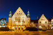 Neorenaissance facade of the building of the university auditorium at night in Poznan