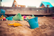 Childhood sandbox concept: Close up of plastic toy bucket