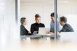 © Westend61 - Young business people having a meeting in office