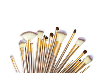 Wall Mural - Cosmetic Makeup brushes on white background. Flat lay, top view, copy space. Makeup accessories, mockup, template