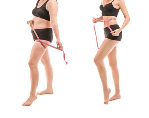 Wall Mural - Young woman with measuring tape before and after weight loss on white background