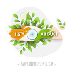 Poster - 15th August Text on Human Hand Print From India Flag in Brush Stroke Style with Green Leaves for Happy Independence Day Concept.