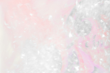 Wall Mural - light reflecting a pink surface background