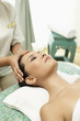 © ImageHit - Woman enjoying a facial massage