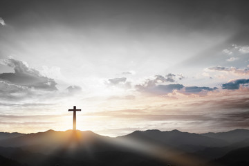 Wall Mural - christmas concept: crucifixion of jesus christ cross at sunset