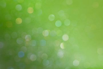 Wall Mural - bokeh pattern on an olive green background