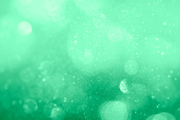 Wall Mural - turquoise green bokeh patterned background