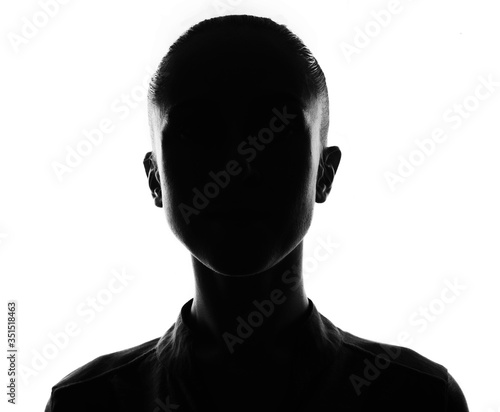 Fotomural Female person silhouette, back lit over white