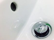 Close-up Of Sink Plug In Bathtub