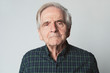 © rawpixel.com - Displeased senior man in a studio shoot