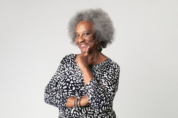 Wall Mural - Cheeky black senior woman with afro hair