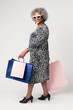 © rawpixel.com - Happy senior woman on a shopping spree