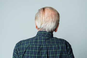 Sticker - Rear view of a senior man crown balding