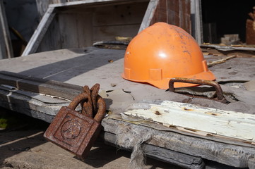 Old helmet in an abandoned Russian workshop of a coal mine in the arctic. 