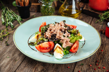 Wall Mural - Gourmet tuna salad with eggs greens and sauce