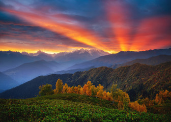 Poster - Fantastic brilliant sunrise with rays breaking through the clouds. Location place of  Upper Svaneti, Georgia country.