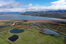 An Aerial  View Of A Reservoir And Dam Creating A Tailwater Fishery.