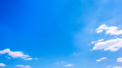 Wall Mural - Beautiful blue sky with fluffy clouds as a background